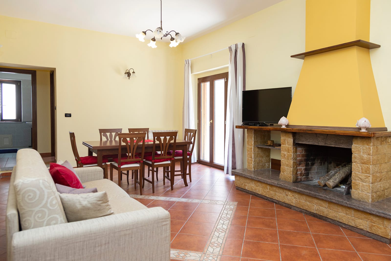 Living room with stone fireplace